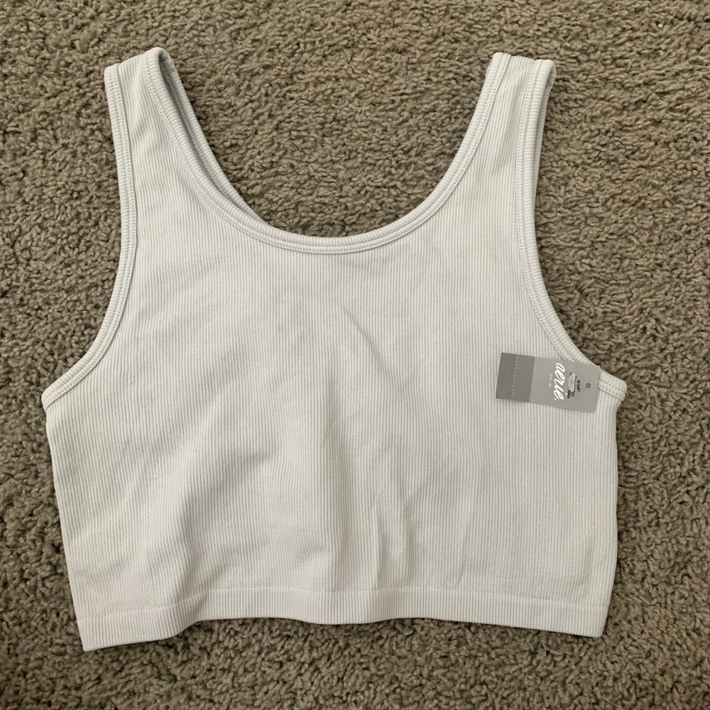 NEW Aerie tank with built in lining. Perfect condition never worn